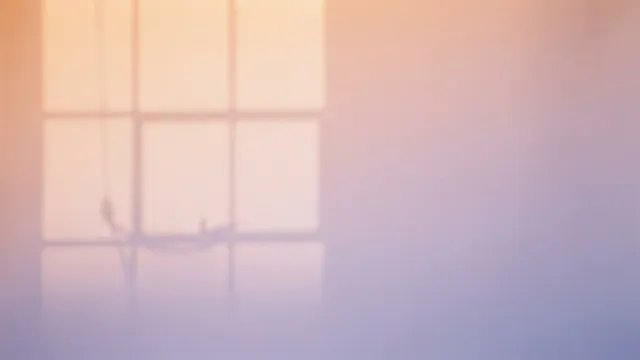 A soft peach-to-lavender gradient on a paper backdrop with the faint shadow of a window frame